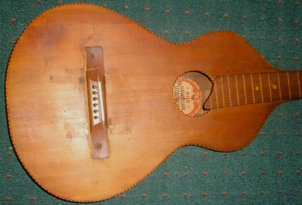 Seen one of these before? HiLo Hawaiian Steel Guitar. Hollowneck!!
