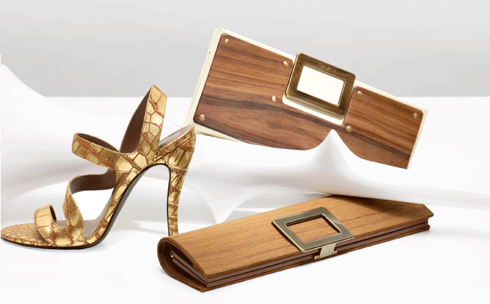 White patent Belle Vivier clutch with wood plaque 1/6 Metallic gold crocodile leather banded sandals 1/15 Soft Teak wood Tube clutch 1/20