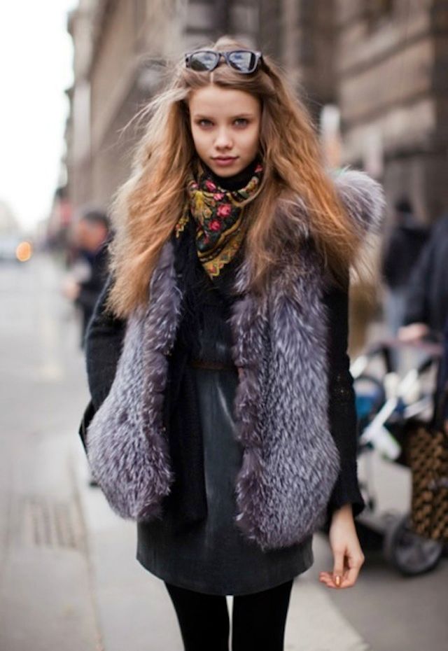 girl with grey fur vest