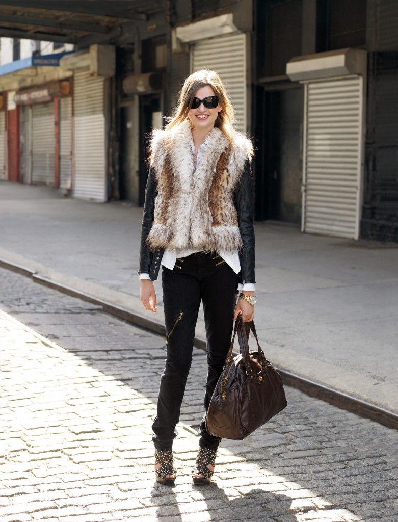 fashion girl with sandals and fur vest