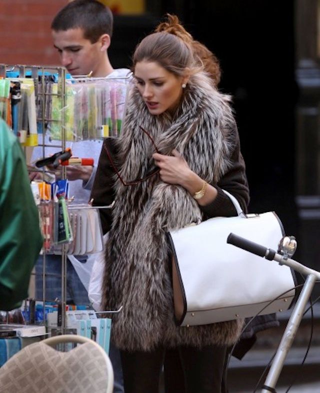 Olivia Palermo street shopping with fur vest