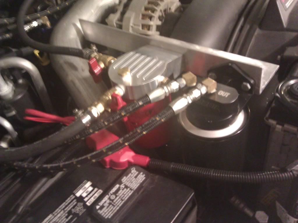 Amsoil Bypass and Coolant Filter both fit under the hood. Amsoil Bypass and Coolant Filter both fit under the hood.